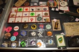 SELECTION OF OLDSMOBILE, FISHER BODY, MOTOR WHEEL PINS ~ RINGS.  PROTEST PIN BACKS AND OTHER COLLECTIBLES  
