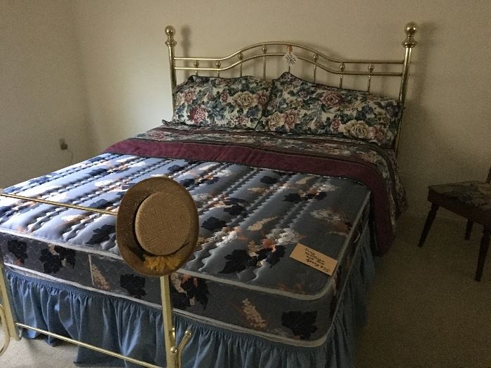 Nice King bed. Brass head board, mattress and box springs. 