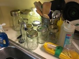 Jars of various makers and kitchen utensils