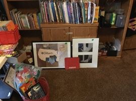 Books, VHS, CD's, DVD's in bedroom entertainment center