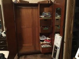 Beautiful Armoire in MBR - opened to show hanging space and drawers