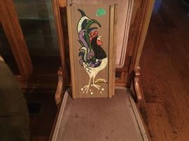Rooster picture inside in front of glass cabinet
