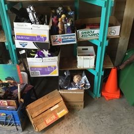 Shelves hold lots of boxes full of toys