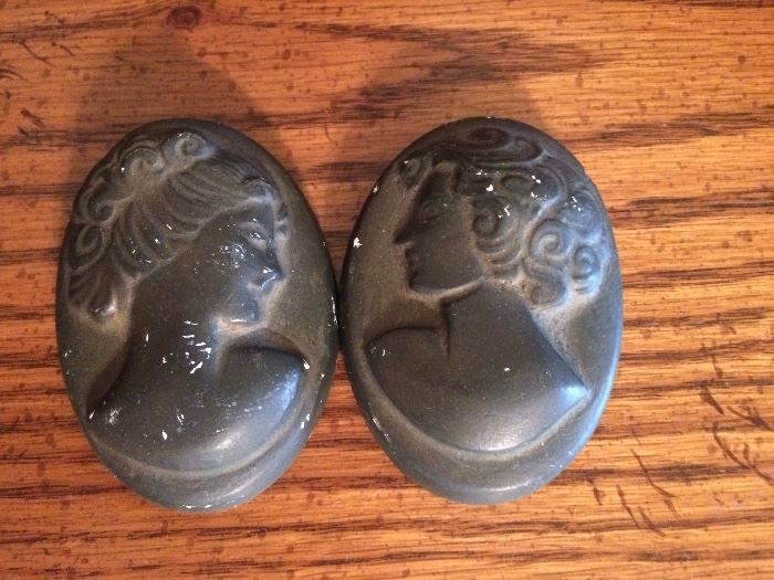 Small pair of plaster cameo wall hangings