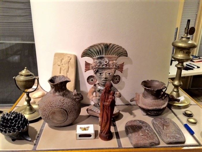 Pottery and other ceramics from Central America, exotic brass lamps, metal hedge hog
