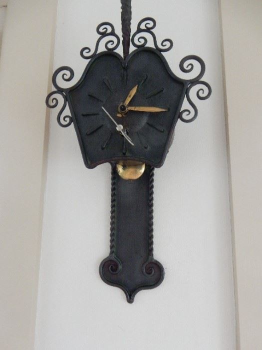 Unusual iron wall clock