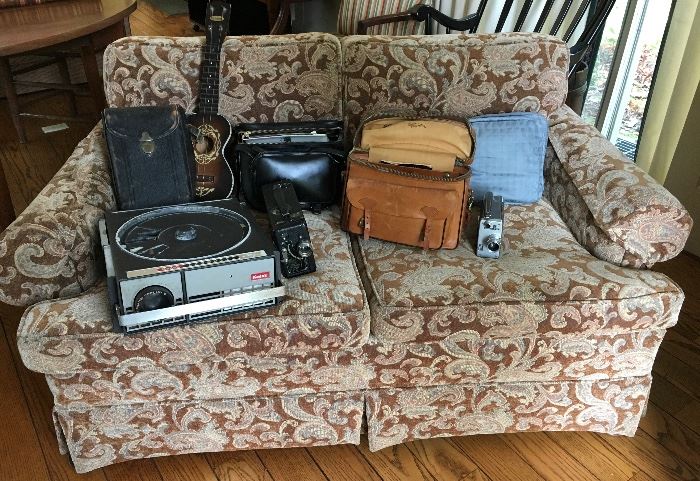 Old Camera and Video, One of Several Sofas