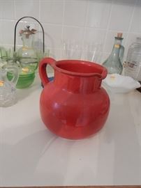 RED STONEWARE PITCHER