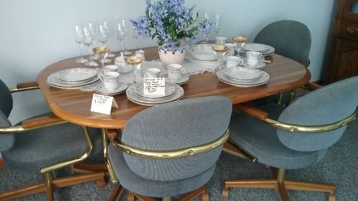 dining table and 4 chairs with service for 8 set of china