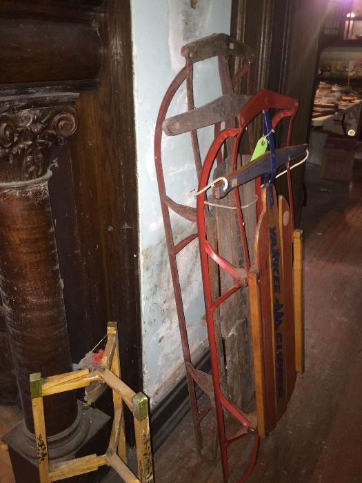 Five different antiques sleds