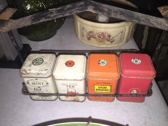 Vintage spice rack with tin cans