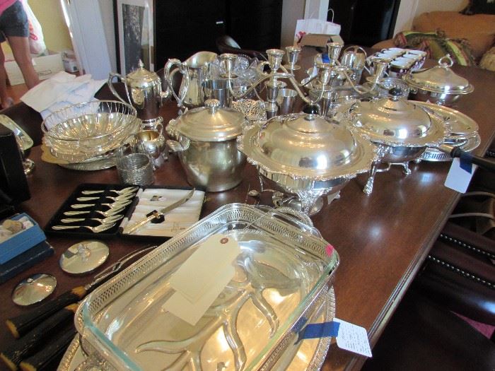 Many silverplate pieces for service