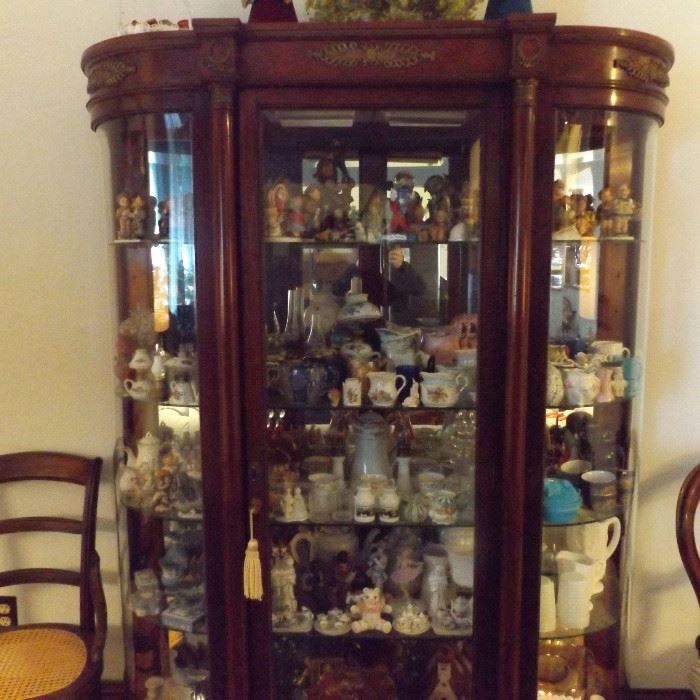 Beautiful bowed glass curio cabinet