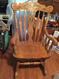 #58	Solid Wood Heavy Rocking Chair with carved top	 $75.00 
