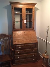 #61	Cabinet	Oak Secretary with 4 drawers & Drop down Front and Glass Shelf Top  36x23x7'2"	 $275.00 
