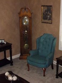Grandfather clock and one of two Broyhill wingback chairs. (tables not for sale)