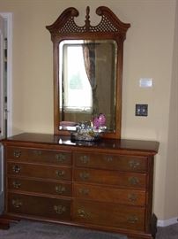 American Drew dresser and ornate wood framed beveled edge mirror, matching night stands, King four post bed.