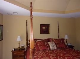 American Drew dresser and ornate wood framed beveled edge mirror, matching night stands, King four post bed. (mattress and box springs not for sale)