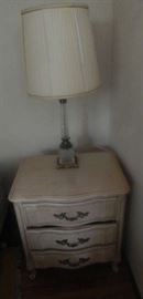 IVORY NIGHT STAND THAT HAS A MATCHING DRESSER