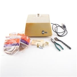 Vintage Inland "Wiz" Glass Grinder with Copper Foil: A vintage Inland Wiz glass grinder with copper foil. The machine features an off-white plastic casing with a rotating grinder mechanism to its top; marked “Wiz” near its white power switch. It includes its original paperwork, pliers, a brush, hardware, and three packages of copper foil by Venture Tape.