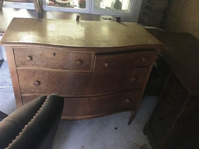 Antique dresser with matching mirror. 