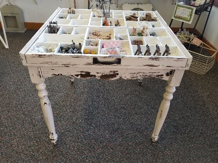 Glass top display table with two sliding drawers