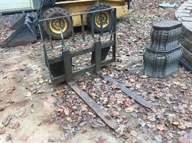 Fork lift attachment for the New Holland skid loader