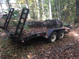 Trailer for hauling the New Holland skid loader, tracks (never used) for the skid loader are on the trailer