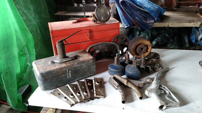 Tool boxes, unusual blue casters with wheel covers, Browning metal pulley and assortment of others, oil can, metal door knob plates, OPW gas pump nozzle and other misc.