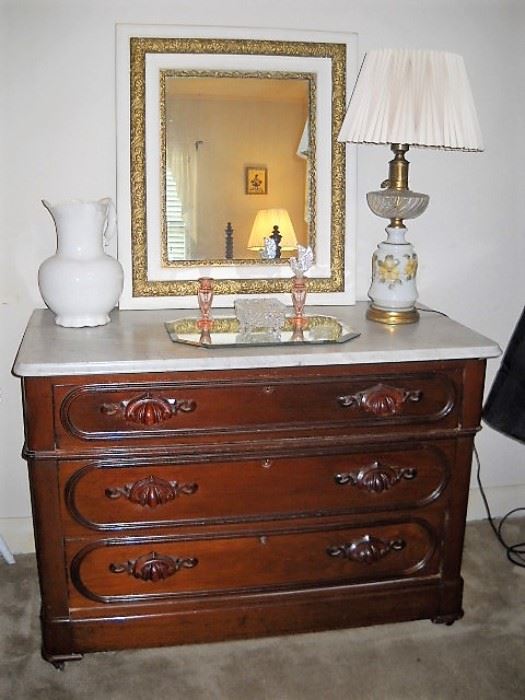 MARBLE TOP CHEST WITH CARVED WOOD HANDLES
