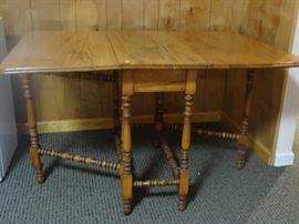 antique drop leaf table 49 x 36. sides folded down 14 x 36