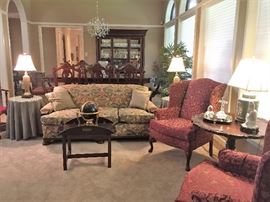 Gorgeous SofaCampaign TableUpholstered Wingback ChairsTilt Top Table