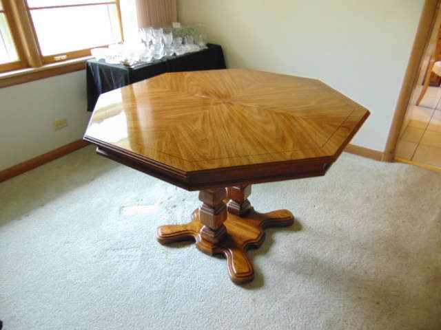 Dining room table (table comes with custom made pads and leaves)