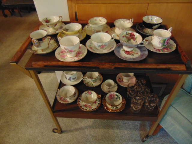 Tea cup collection on serving cart