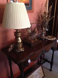 Antique table; taxidermy bird in glass case