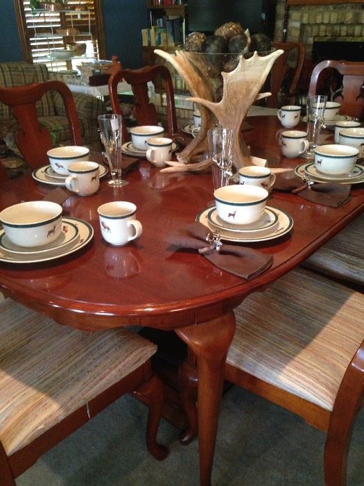 Dining table and chairs; great "hunting cabin style" dishes