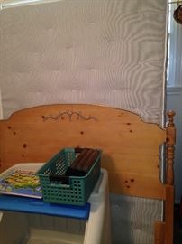 Full bed has matching TV stand and desk/dresser