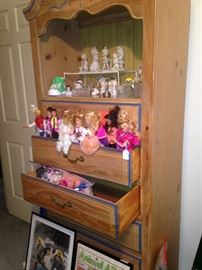 TV stand with dolls and Precious Moments