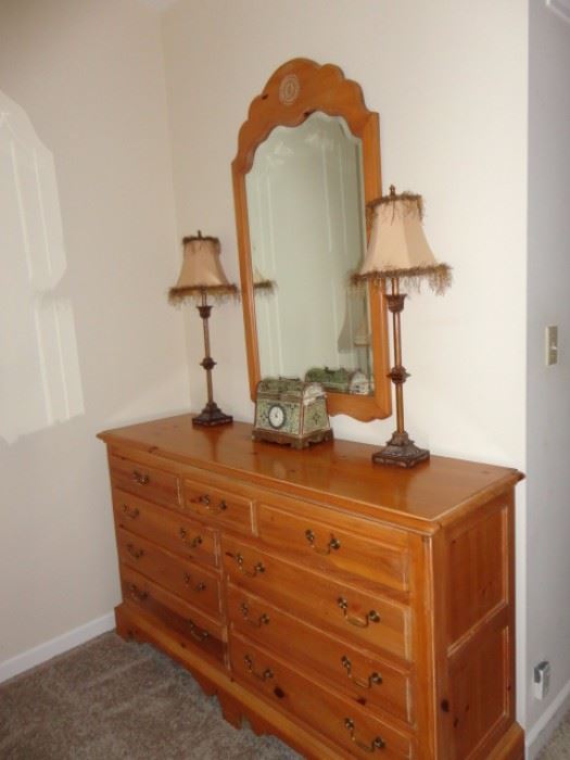 Thomasville dresser and mirror.  Two lamps with feather shades.  Jewelry box with clock.