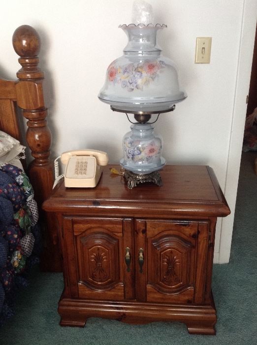 This is one of 2 night stands included in the bedroom set.  Gone with the Wind style lamp. It is a set of 2 and it us new.  Vintage push button phone.