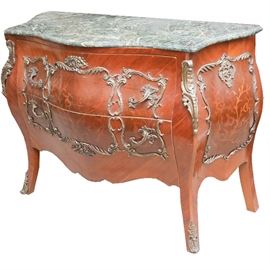 Vintage Louis XV Style Bombe Chest: A vintage Louis XV style bombe chest. This amorphic top chest with green granite panel features a beveled edge over a walnut stained frame. The frame features two dovetail joinery drawers with applied decorative brass hardware over a scalloped apron rising on splayed legs. The stiles, side panels, and feet include additional decorative brass hardware.