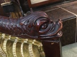 Detail: carved  dolphin handrest 