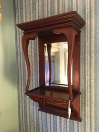 Unusual wall hung mirror and shelf