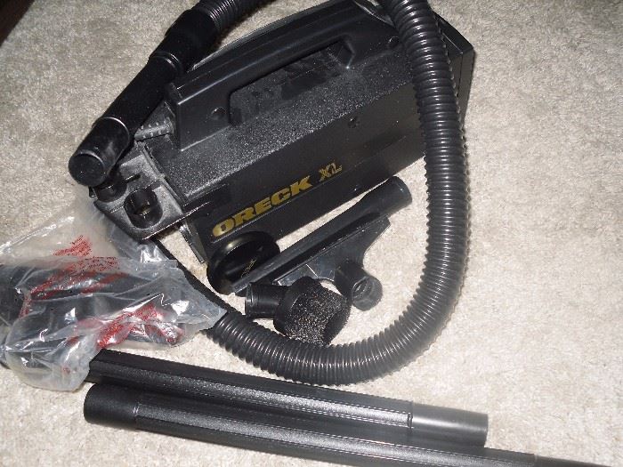 Oreck XL Vacuum - This is a lightweight vacuum.  Perfect for apartments, rugs, 2nd downstairs vacuum.