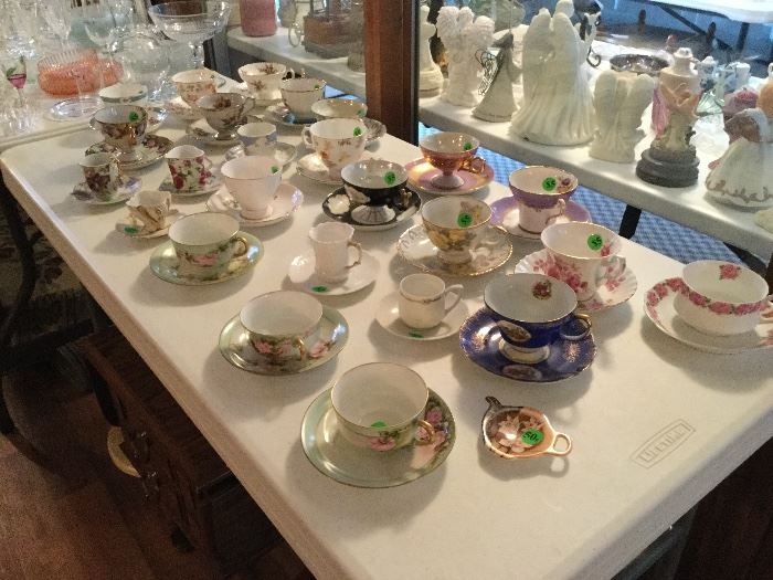 lots of cups and saucers