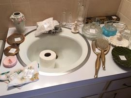 nice vanity collection of compact mirrors and brushes and more