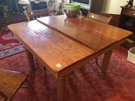 nice oak table with side chairs