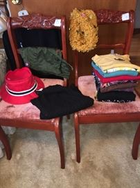 two matching chairs with ladies hat collection