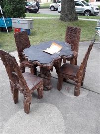  Beautiful Hand Carved Table and chairs. 