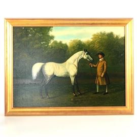 Oil Painting After George Stubbs' "Gimcrack": An oil painting on canvas after George Stubbs’ (1724-1806) painting Gimcrack. This work depicts a man in a yellowish suit holding the reigns of a white horse, all against a leafy green background. The original work places the figures before a stone building. The painting is presented, unsigned, in a gold tone frame and has a wire to its verso along with a label noting the provenance of the painting.